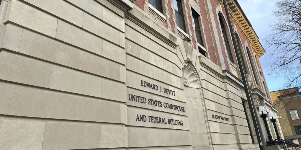 The Edward J. Devitt U.S. Courthouse and Federal building is seen, where two men on trial face human smuggling charges, Monday, Nov. 18, 2024, in Fergus Falls, Minn. (AP Photo/Michael Goldberg)