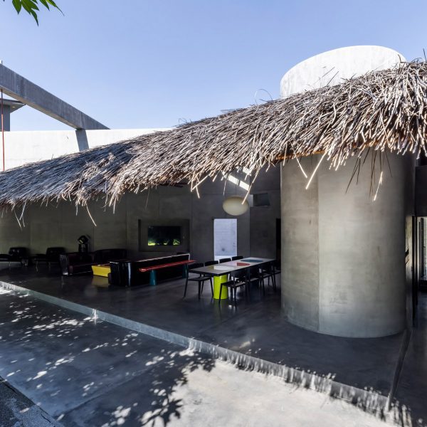 Kientruc O tops sculptural Thu House with large thatched roof in Vietnam