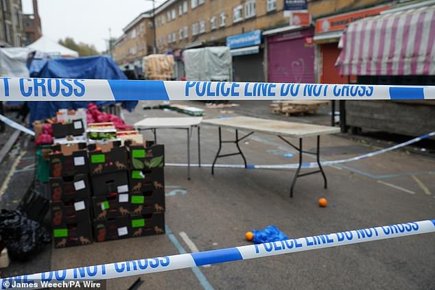 London’s day of shameful violence on Remembrance Sunday: Separate triple shooting and stabbing leave two dead moments before the capital fell silent for two minutes silence