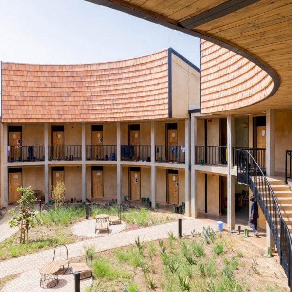 MASS Design Group uses earthen walls for Rwandan university campus