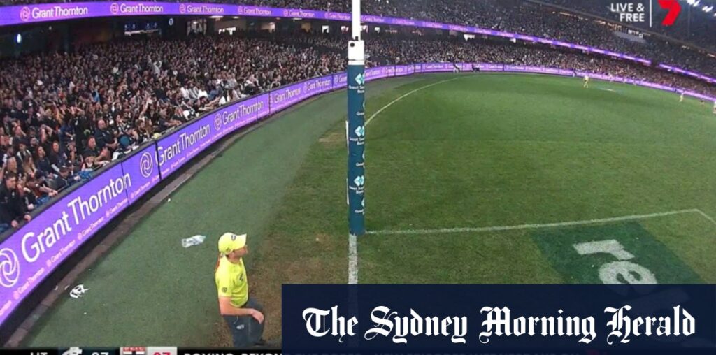 Man accused of throwing bottle at AFL goal umpire challenges CCTV