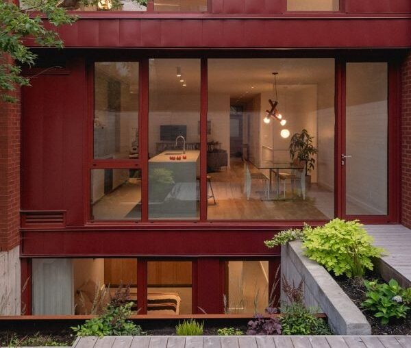 Naturehumaine uses "Merlot" red palette for duplex renovation in Montreal