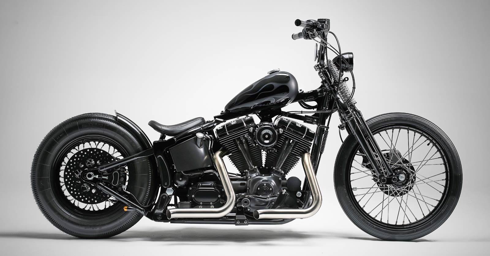 Obsidian: A slammed and stripped Harley Softail Deuce from Warsaw