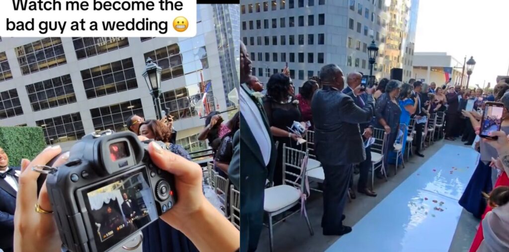 A photographer's camera display shows a wedding ceremony. The scene is set outdoors, with guests seated along a white aisle in a cityscape. A person is seen stepping into the aisle. A caption reads, "Watch me become the bad guy at a wedding.