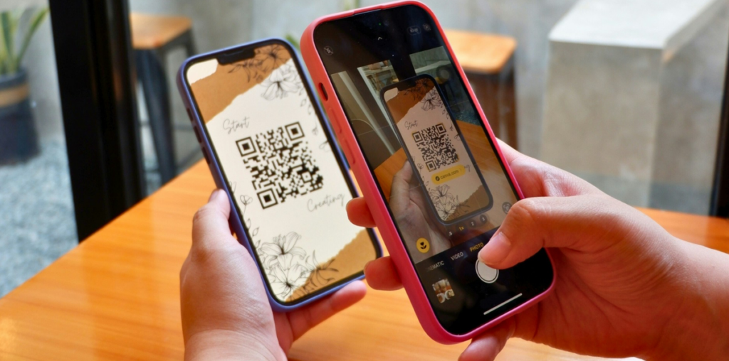 A person scanning a QR code on a smartphone