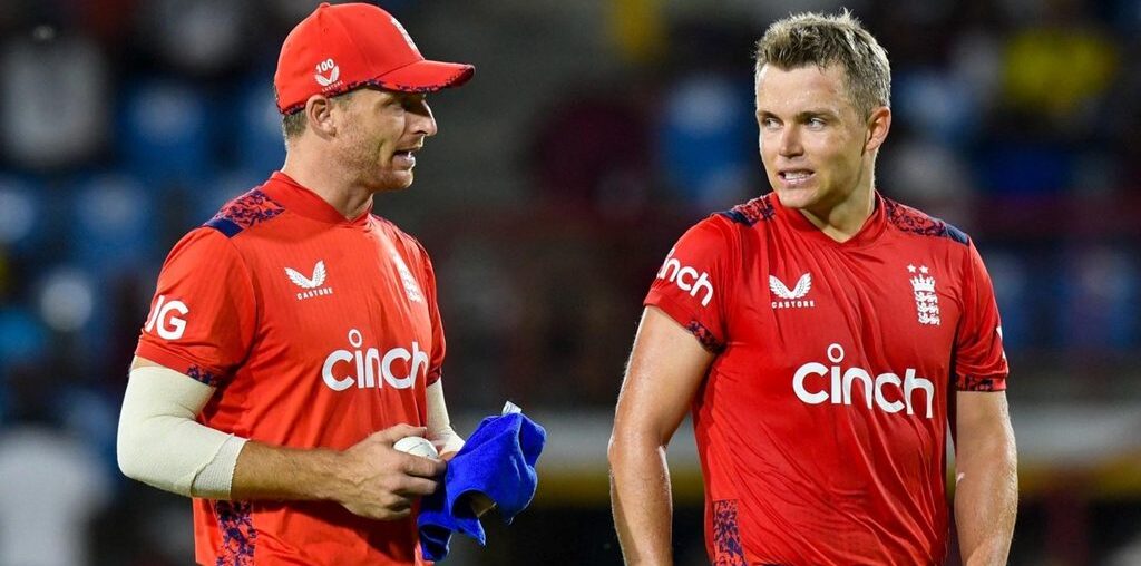 Sam Curran in discussion with Jos Buttler during England