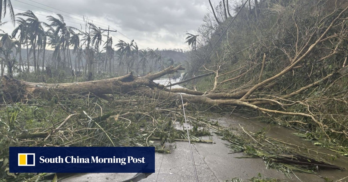 Super Typhoon Man-Yi weakens as it sweeps through the Philippines