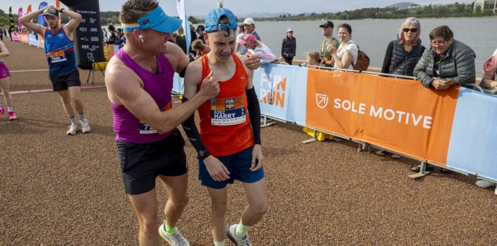 Tears of joy as young Harry Irvine celebrates marathon triumph