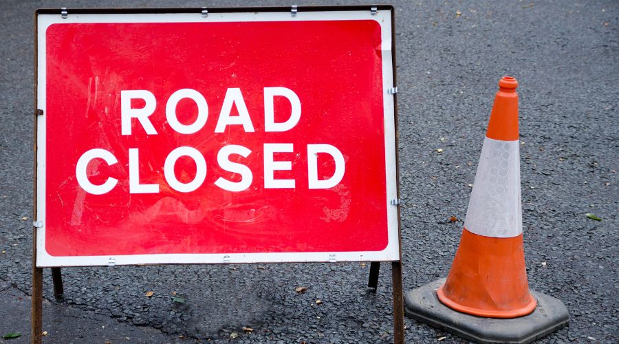 Tractor with trailer full of hay overturns on busy road in Essex – Farmers Guide