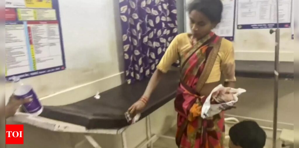 Two suspended after video shows pregnant woman cleaning husband’s bed in Madhya Pradesh hospital - Times of India