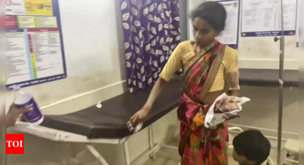 Two suspended after video shows pregnant woman cleaning husband’s bed in Madhya Pradesh hospital – Times of India