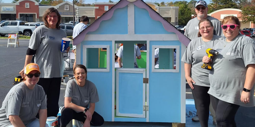 UT Federal Credit Union Builds Playhouse for Local Veteran Family