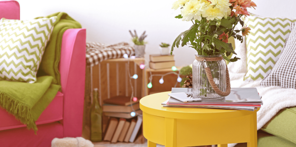 Colorful room decor in pink, yellow, and green.