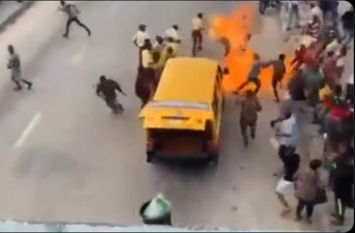 VIDEO: Commercial driver ‘resisting arrest sets LASTMA official ablaze’ in Lagos