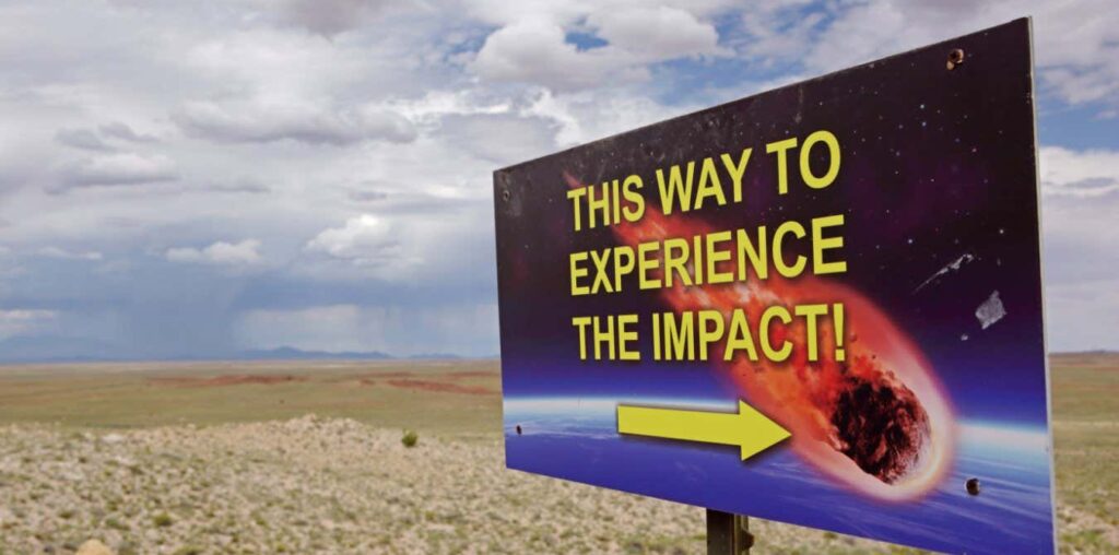 2HAJ7KN This way to experience the impact - sign on the road to Meteor Crater, Northern Arizona, USA