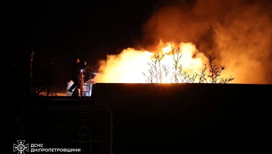 In this photo provided by the Ukrainian Emergency Services on Nov. 21, 2024, rescue workers put out a fire of a building which was heavily damaged by a Russian strike on Dnipro, Ukraine. (Ukrainian Emergency Service via AP)