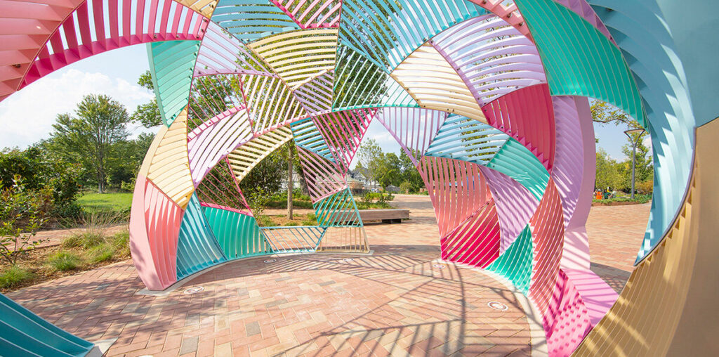 colorful dome-like pavilion by hou de sousa in arkansas resembles a quilt buoyed into the air