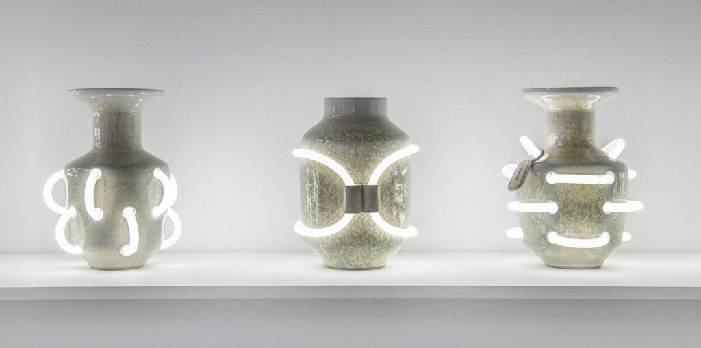 néophore series by döppel studio embeds neon lights into ceramic amphorae